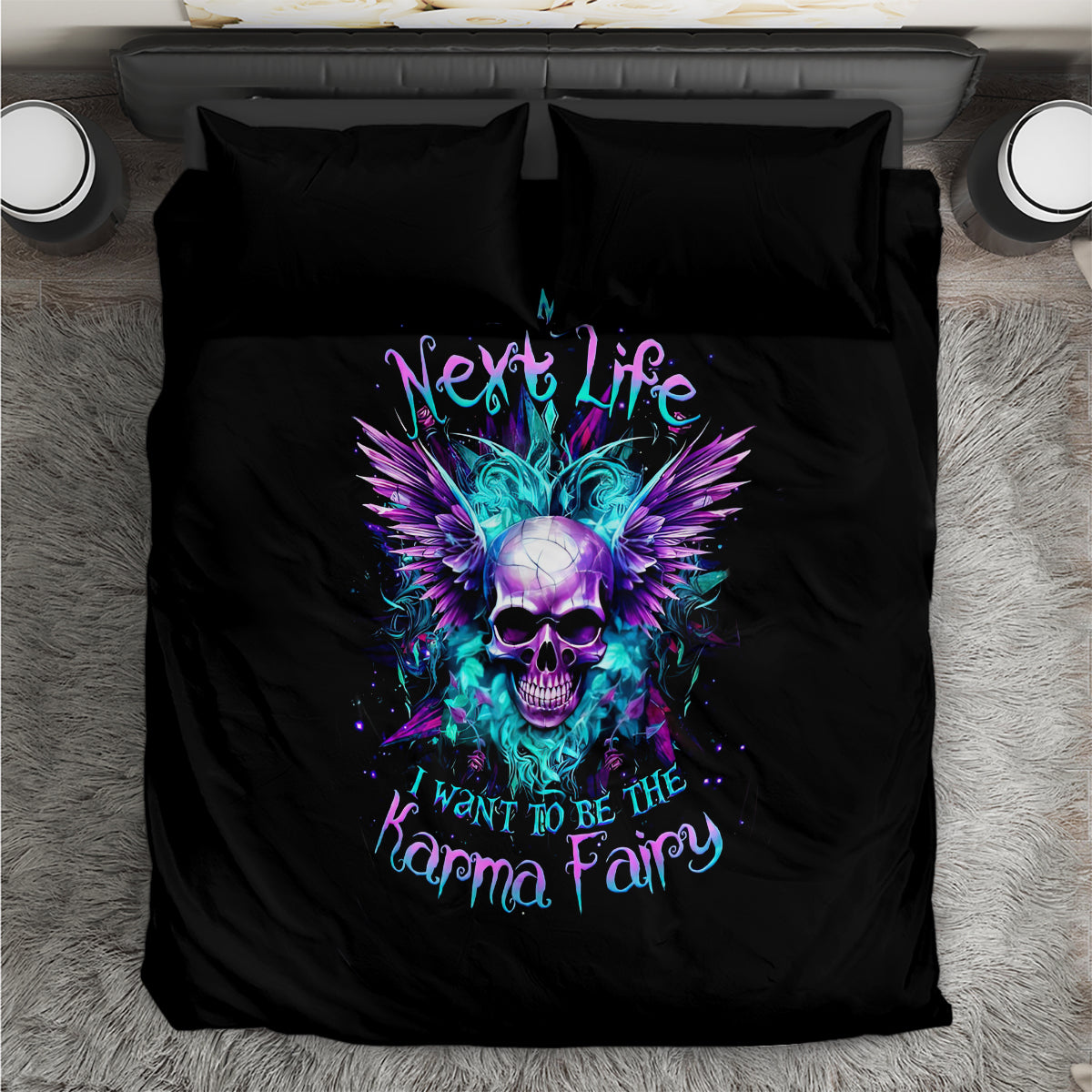Black bedding set with centered skull and purple/teal wing graphic plus two pillowcases