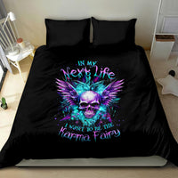 Black bedding set with purple/teal skull-and-wing graphic on duvet with two pillowcases