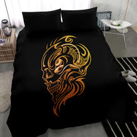 Black tattoo skull bedding set with gold and orange skull face graphic on duvet