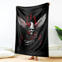 Black skull and wings blanket with red roses and flame accents, draped on bed