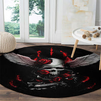 Black round rug with skull, red dripping details, and gray feathered wings
