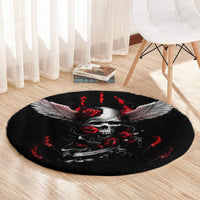 Black round rug with skull medallion, red roses, and wide winged design