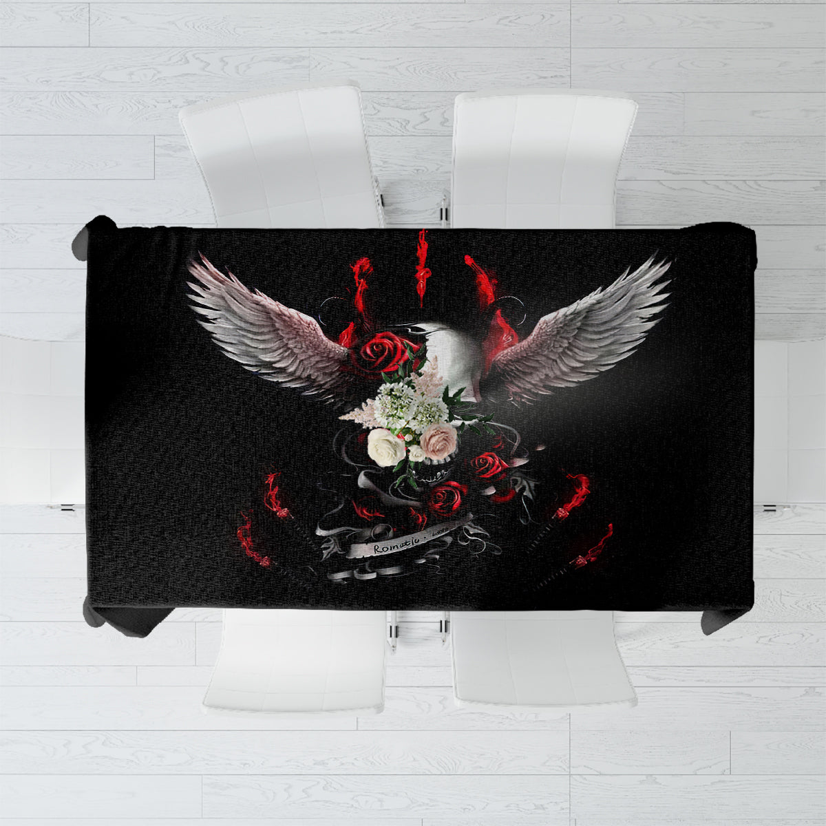 Black tablecloth with skull and winged rose graphic, red accents