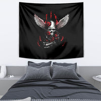 Black skull wings tapestry draped above bed, red roses and flame artwork.