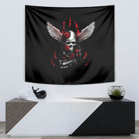 Black tapestry with skull and white angel wings, red roses and flames on wall.