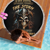 Black round beach blanket with warrior skull graphic and white fringe edge