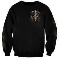 Black crewneck sweatshirt with small skull graphic centered on chest