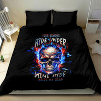 Black bedding set with central fire skull design and two matching pillowcases