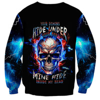 Black unisex sweatshirt with flaming skull graphic and lightning sleeve accents