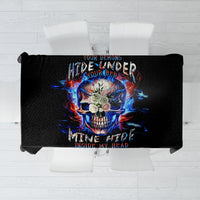 Black tablecloth featuring a blue-red flaming skull graphic centered on table