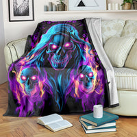 Black skull and flame graphic fleece blanket, blue-purple hooded skull trio design
