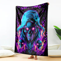Black wall-hung fleece blanket with blue-purple hooded skull face and flaming skulls