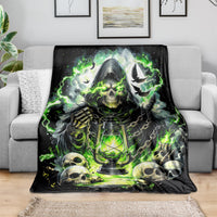 Black sofa throw blanket with hooded reaper skeleton, lantern, chains, and green glow