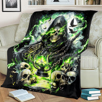 Black recliner throw blanket with green neon hooded reaper skulls and lantern