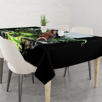 Black tablecloth with green skull, graveyard and lightning graphic, rectangular