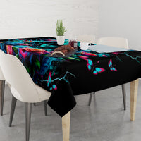 Black tablecloth with vibrant skull, roses, butterfly accents, and electric-blue details