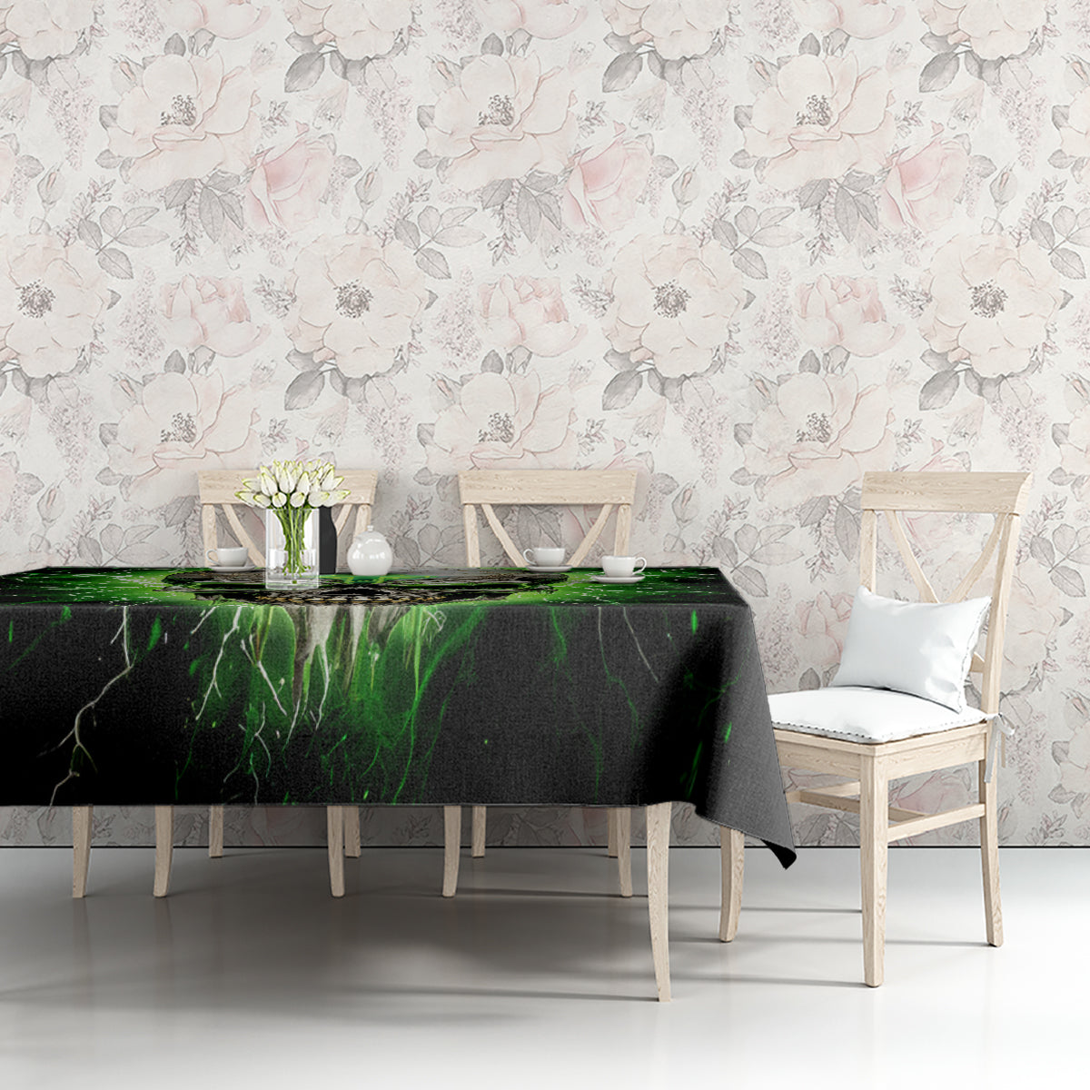Black tablecloth with green lightning skull graphic on dining table with chairs