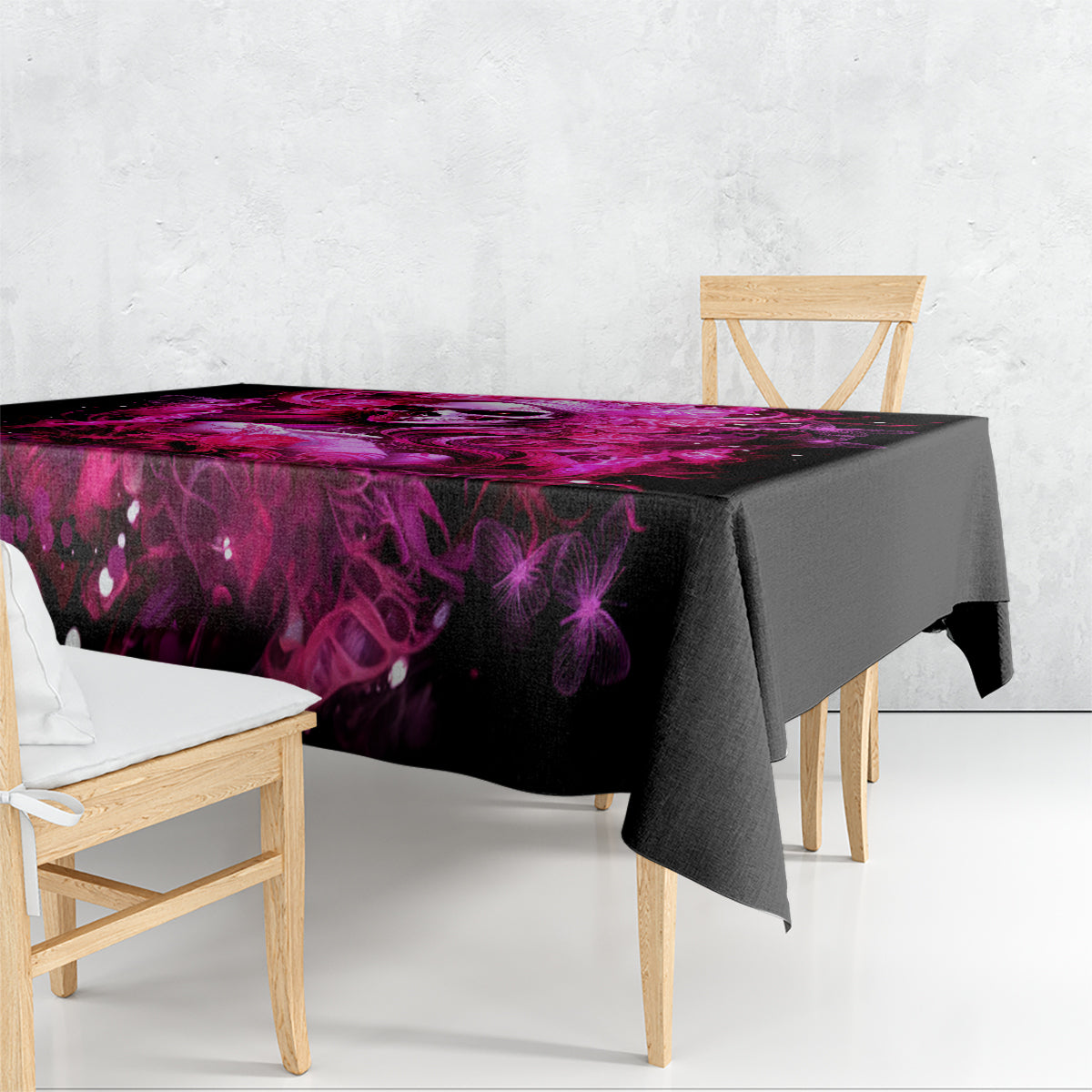 Black tablecloth with purple gothic flame and skull-lady print, draped over table