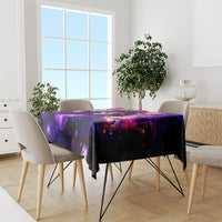 Black tablecloth with purple fantasy design on dining table, modern chair set