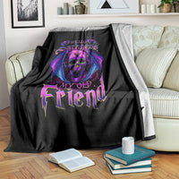 Black skull graphic throw blanket on a couch with purple “My Old Friend” wording