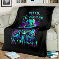 Black skull witch throw blanket on sofa with teal-purple skull witch graphic and My Old Friend