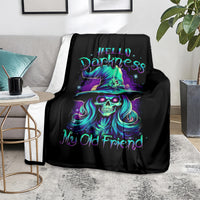 Black skull witch throw blanket on sofa with teal-purple skull and My Old Friend text