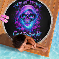 Round black beach blanket with purple skull and rose graphic, fringed edge