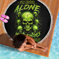Black 150cm round beach blanket with green skull graphic and fringe edge