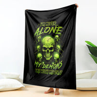 Black blanket hanging with neon green skulls and MY DEMONS ARE WITH ME 24/7 text