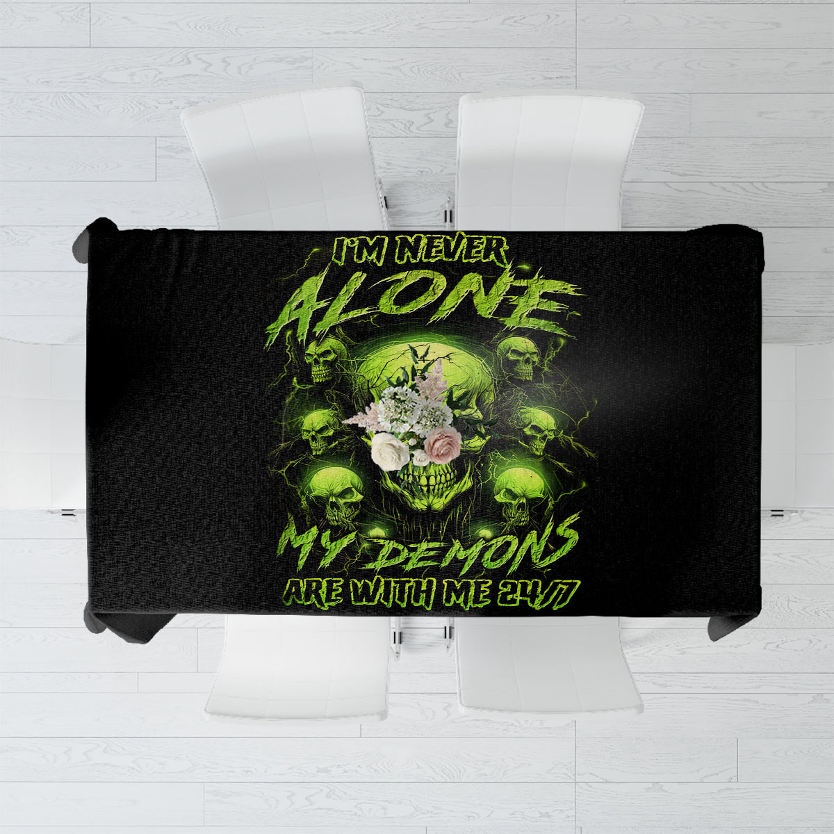 Black tablecloth with centered neon green skull and slogan print, spread flat