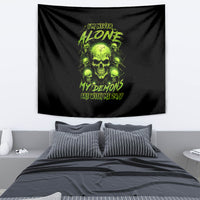 Black skull tapestry with neon green demon graphic and “I’m Never Alone” text