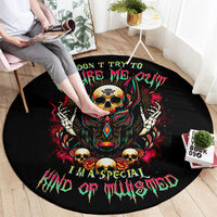 Black round skull rug with Anubis graphic and colorful “Don’t try to figure me out” text