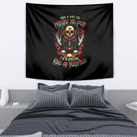 Black tapestry wall hanging with colorful skull and winged Anubis-style graphic