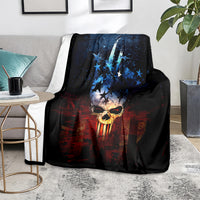 Black skull graphic blanket on living room chair, blue star skull center