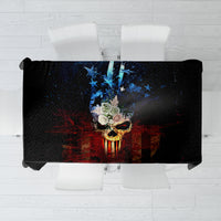 Black skull tablecloth with blue star and red flame graphics over table