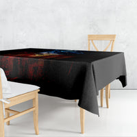Black skull tablecloth draped over table with hanging corner