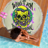Green round beach blanket with skull graffiti print and white fringe edge