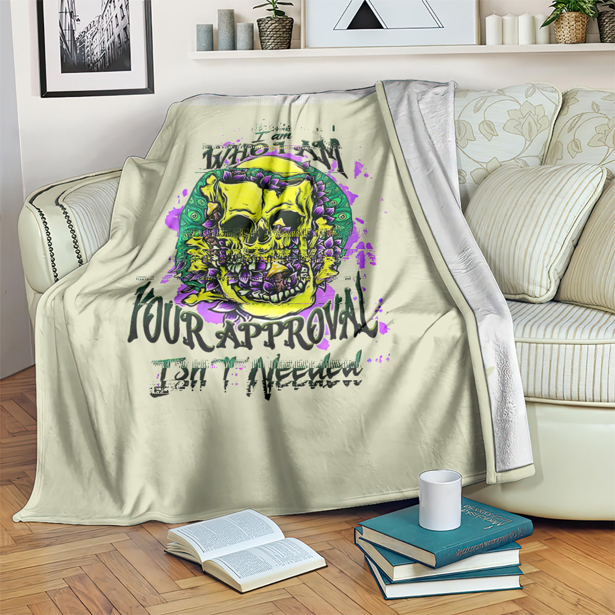 Light green blanket with multicolor skull artwork and stylized slogan text