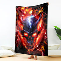 Black flame skull graphic blanket held upright on the floor