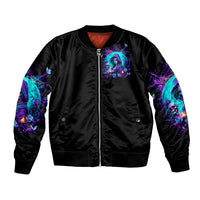 Black bomber jacket with front zipper, neon witch and skull chest graphic and sleeve art