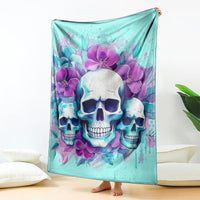 Turquoise skull blanket with purple orchid blooms, hanging upright with corners visible