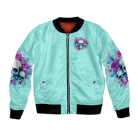 Light blue zip-up bomber jacket with purple skull-and-flower chest patch, black cuffs