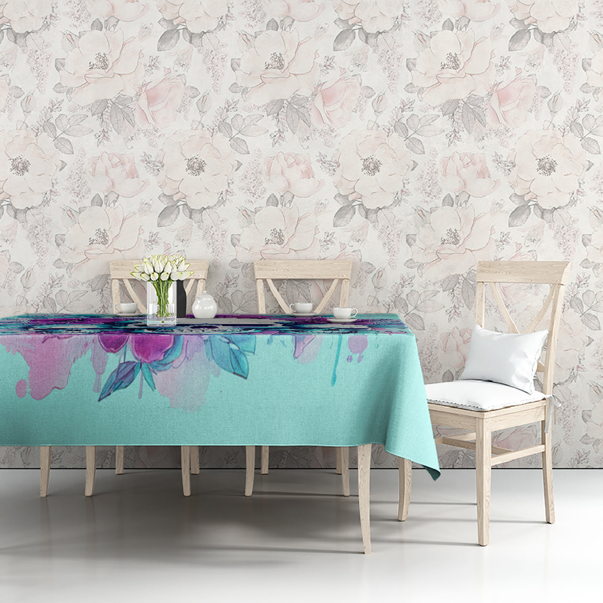 Blue tablecloth with colorful floral skull design on dining table