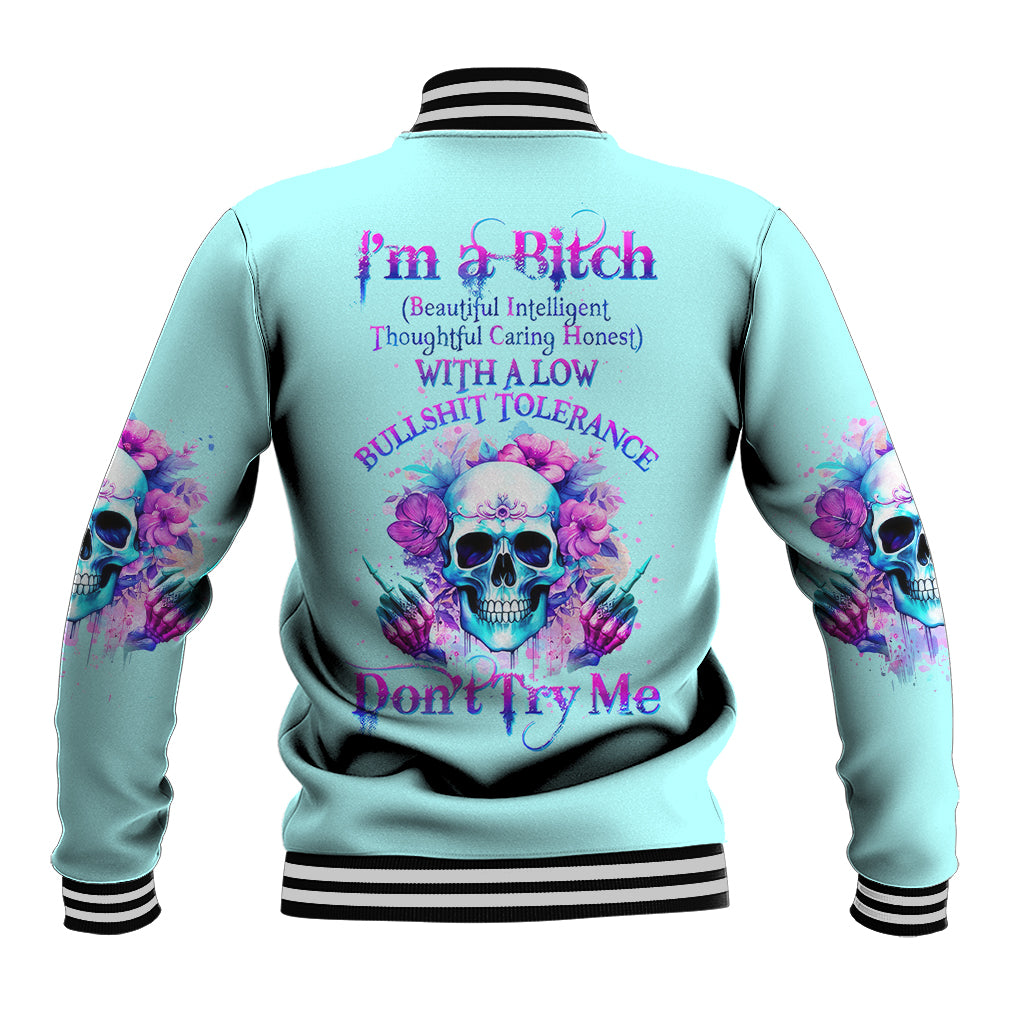 Aqua baseball jacket with floral skull graphic and striped ribbed collar, back view