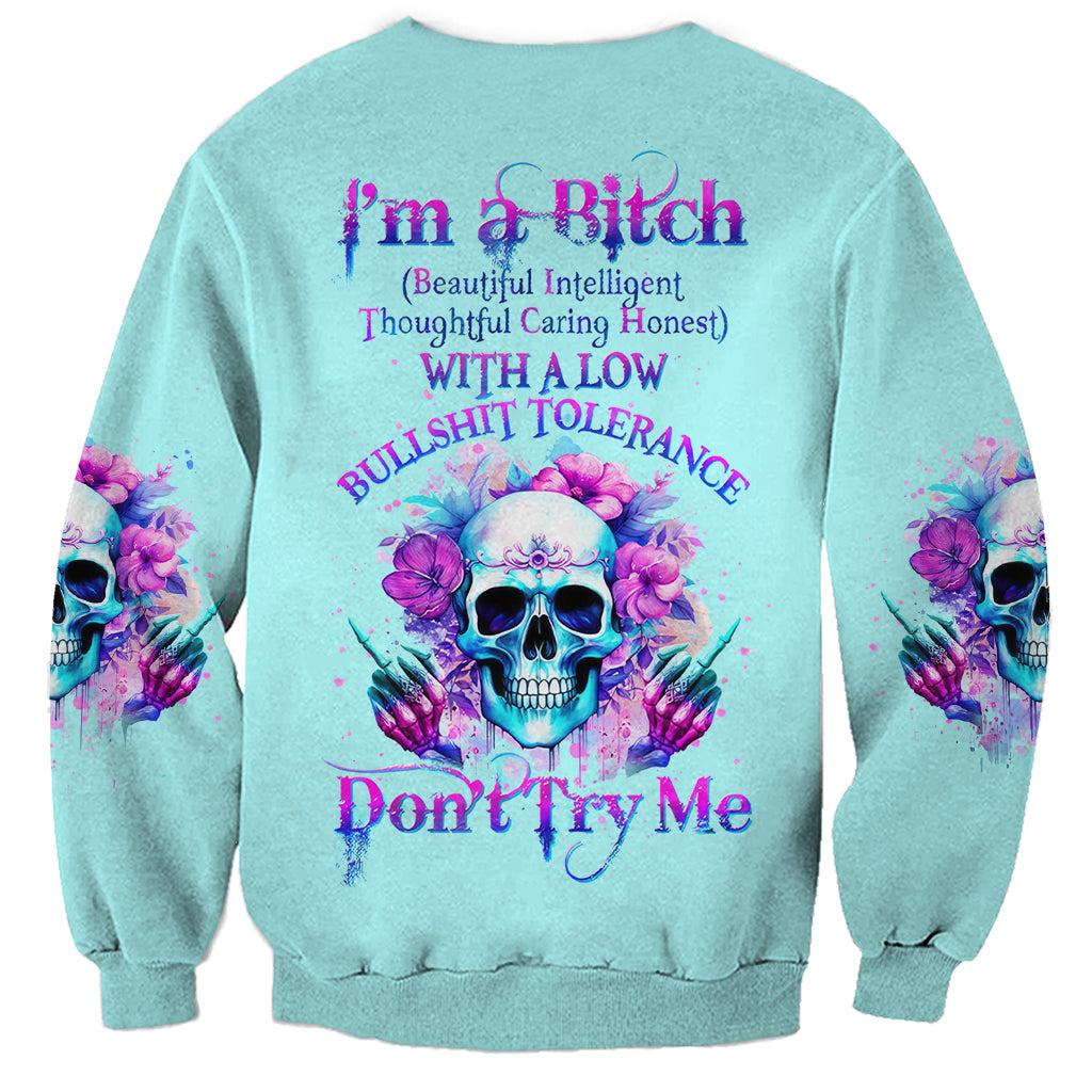Blue crewneck sweatshirt with purple flower skull angel graphic and slogan text