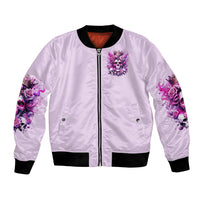 Pink bomber jacket with front zipper, rose skull chest print and ribbed black hem
