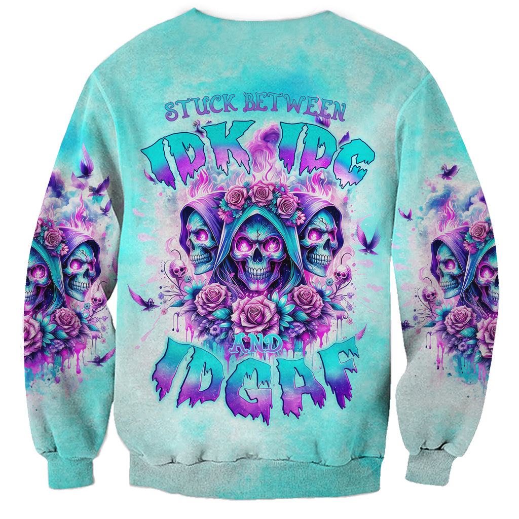 Blue unisex sweatshirt with front skull-and-roses graphic and distressed text print