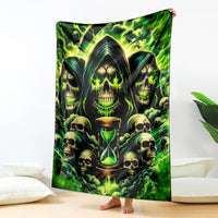 Skull and hourglass flame blanket, green with dark skulls and hourglass design