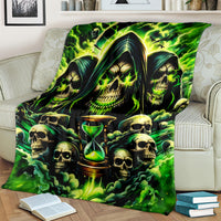 Green skull hourglass flame blanket, bold skull faces and hourglass center