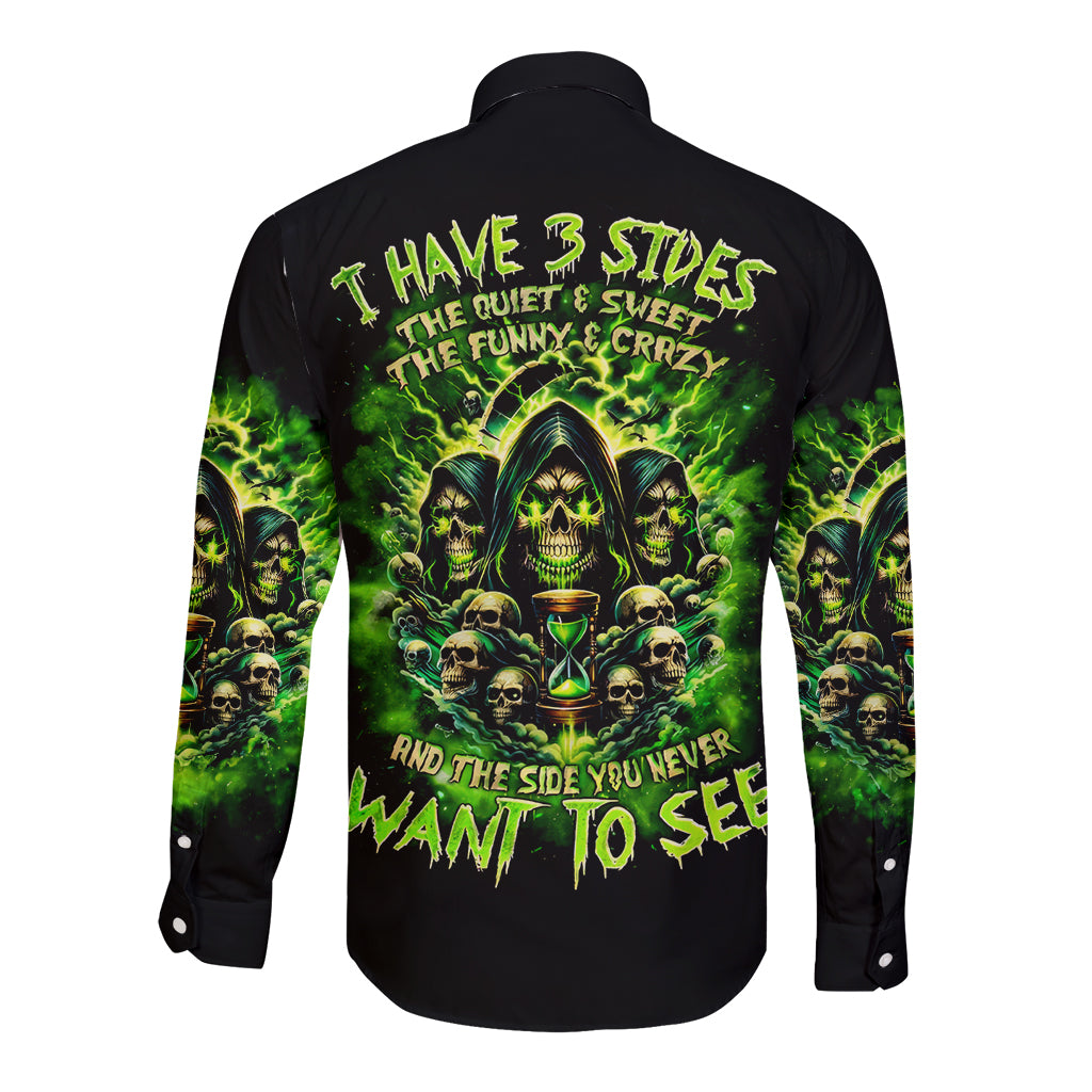 Black long-sleeve button shirt with green flame skull graphic on back